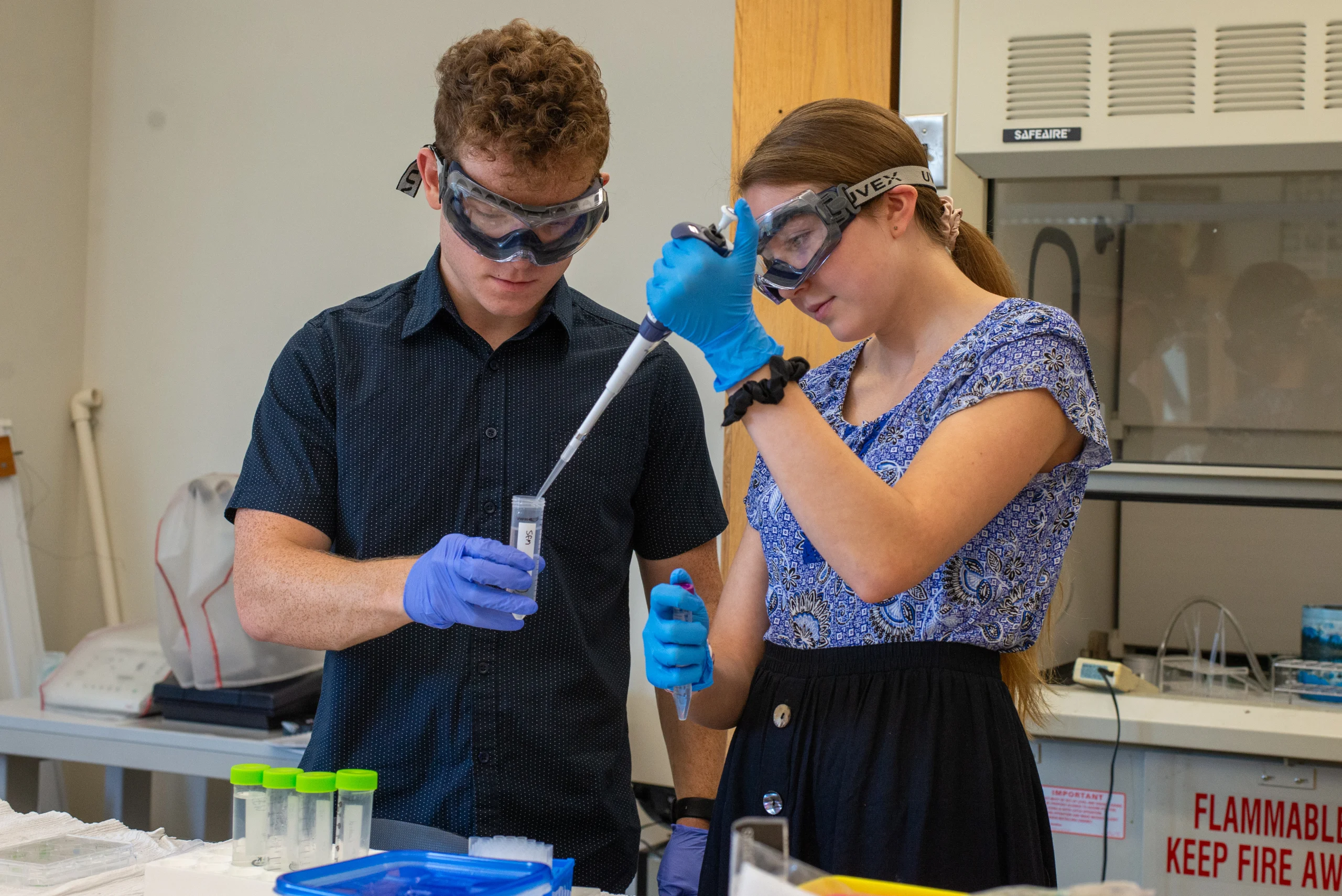 Two students conducting research