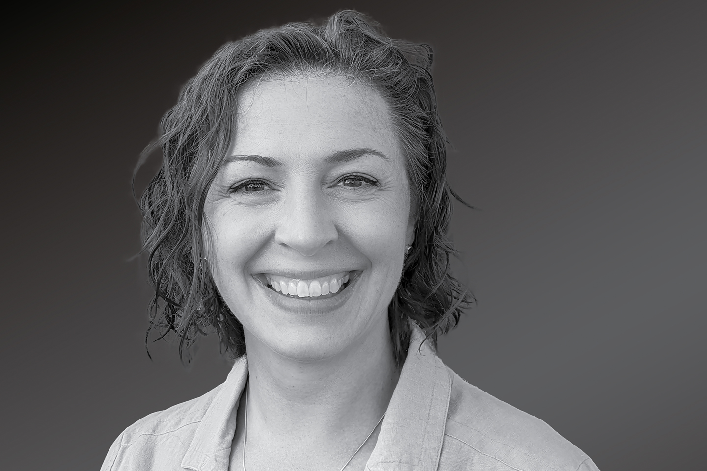 A black-and-white headshot of Rachel Drosdick-Sigafoos