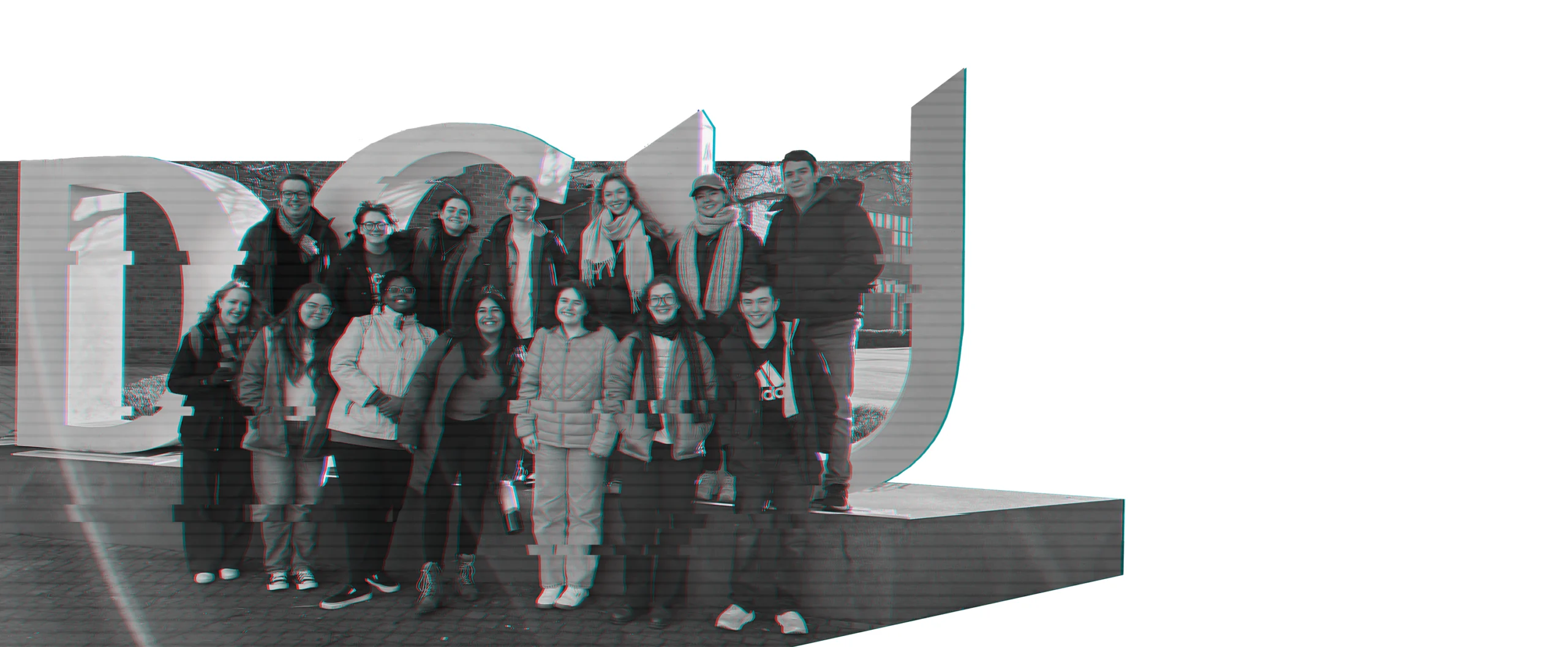 A group of students in two rows posing for a group photo in Ireland.