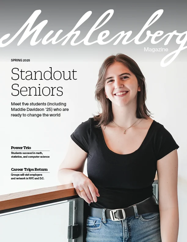 A cover that says Muhlenberg Magazine and has a main headline Standout Seniors next to a photo of a college student in a black T-shirt