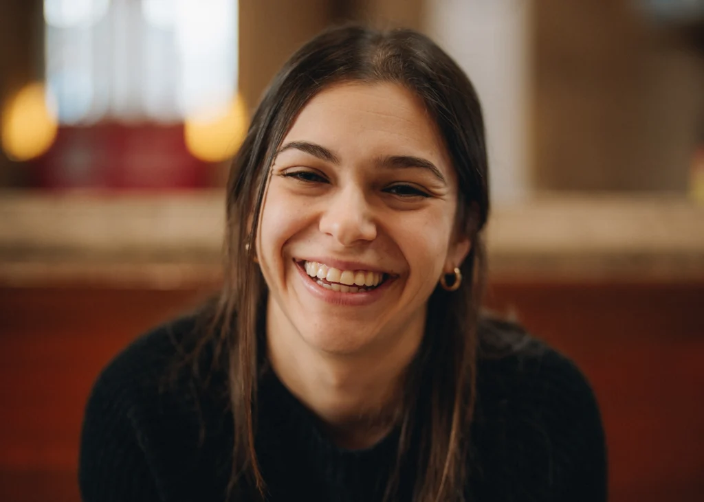 A photo of Emma Rosenthal smiling at the camera