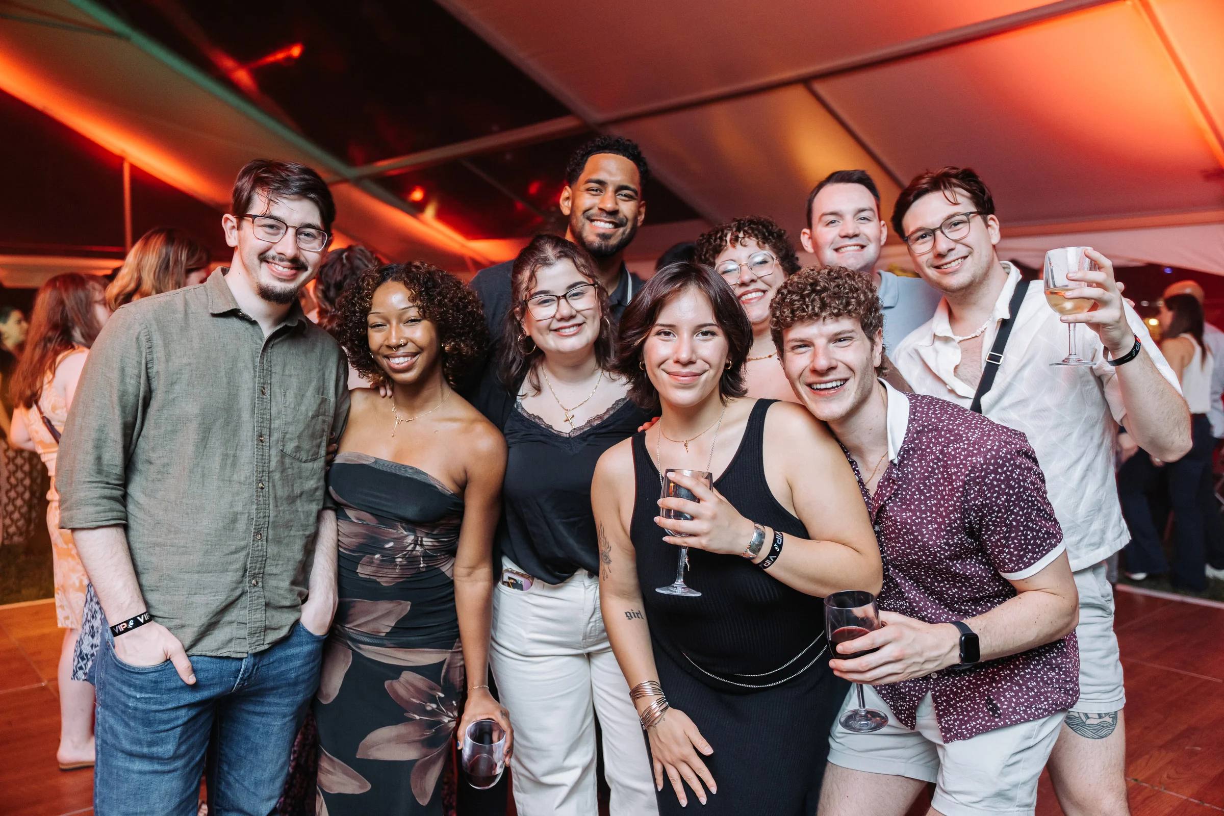 A group of young alumni at a party during reunion weekend