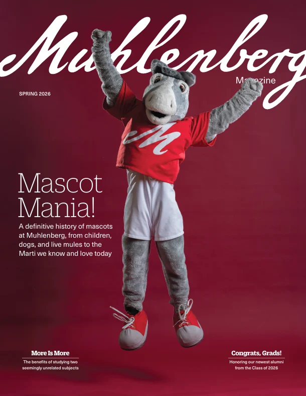 The cover of the Spring 2026 issue of Muhlenberg Magazine, with a jumping mule mascot in front of a red background and the headline "Mascot Mania!"