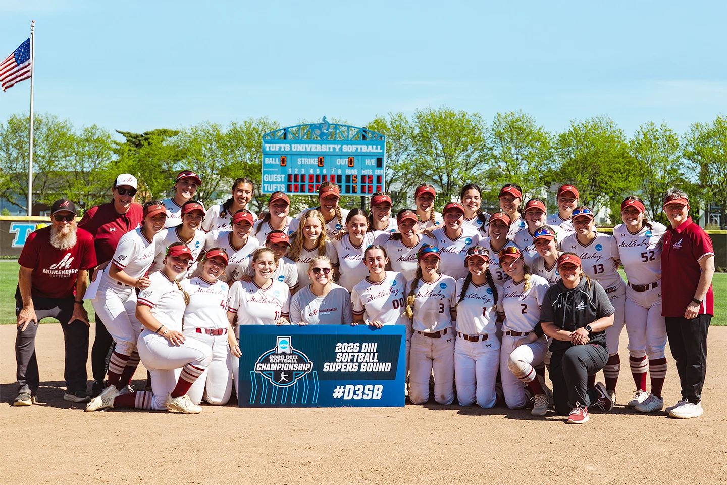 The Muhlenberg softball team poses with a sign that says 2026 DIII SOFTBALL SUPERS BOUND